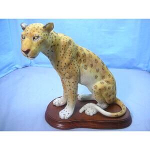 Leopard Textured Unbranded Figurine on Wood Base